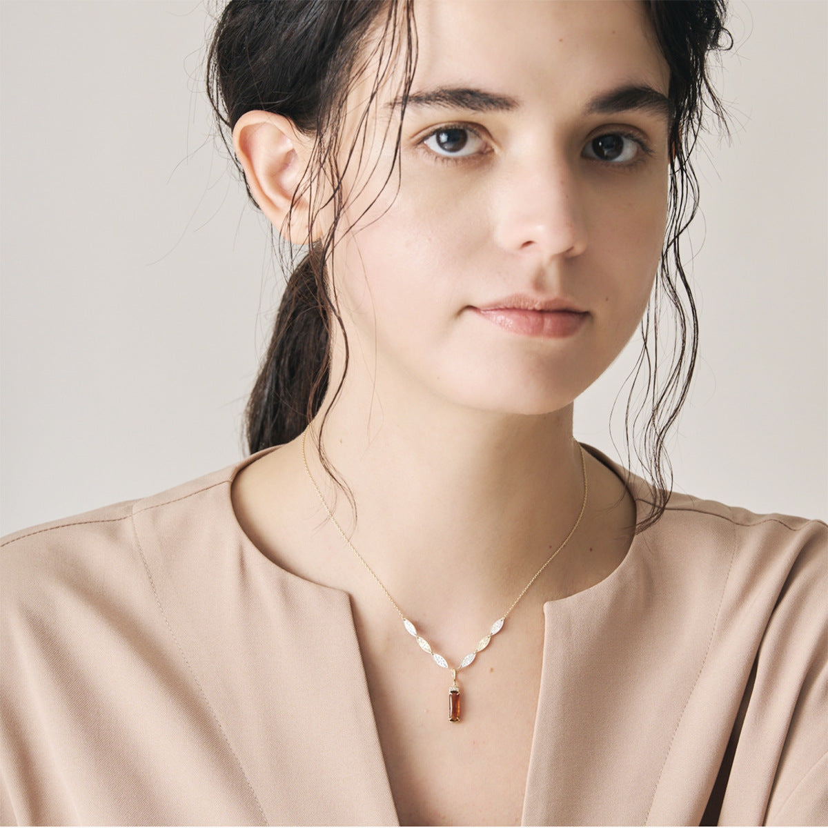 Woman wearing ChrysanthemumCrestnecklace