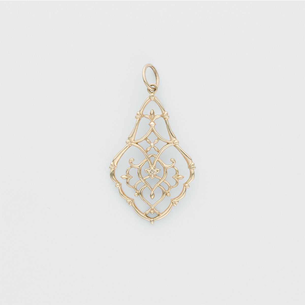 Gold pendant with intricate design from Gembee Jewellery