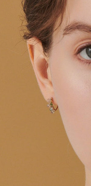 Close-up of a woman's face with a neutral background