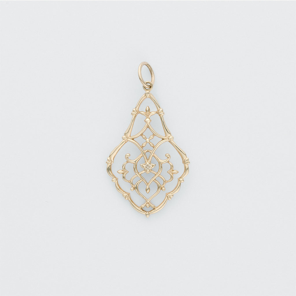 Gold pendant with intricate design from Gembee Jewellery