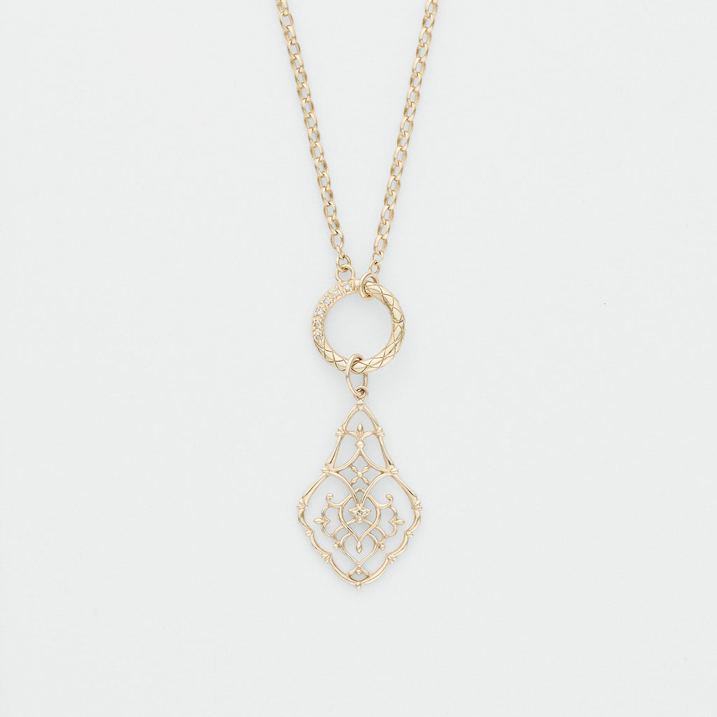 Gold necklace with a decorative pendant from Gembee Jewellery