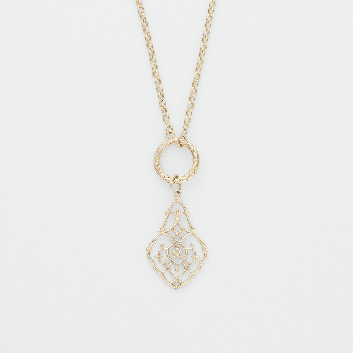 Gold necklace with a decorative pendant from Gembee Jewellery