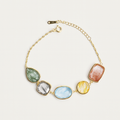 Necklace with multicolored stone pendants on a white background