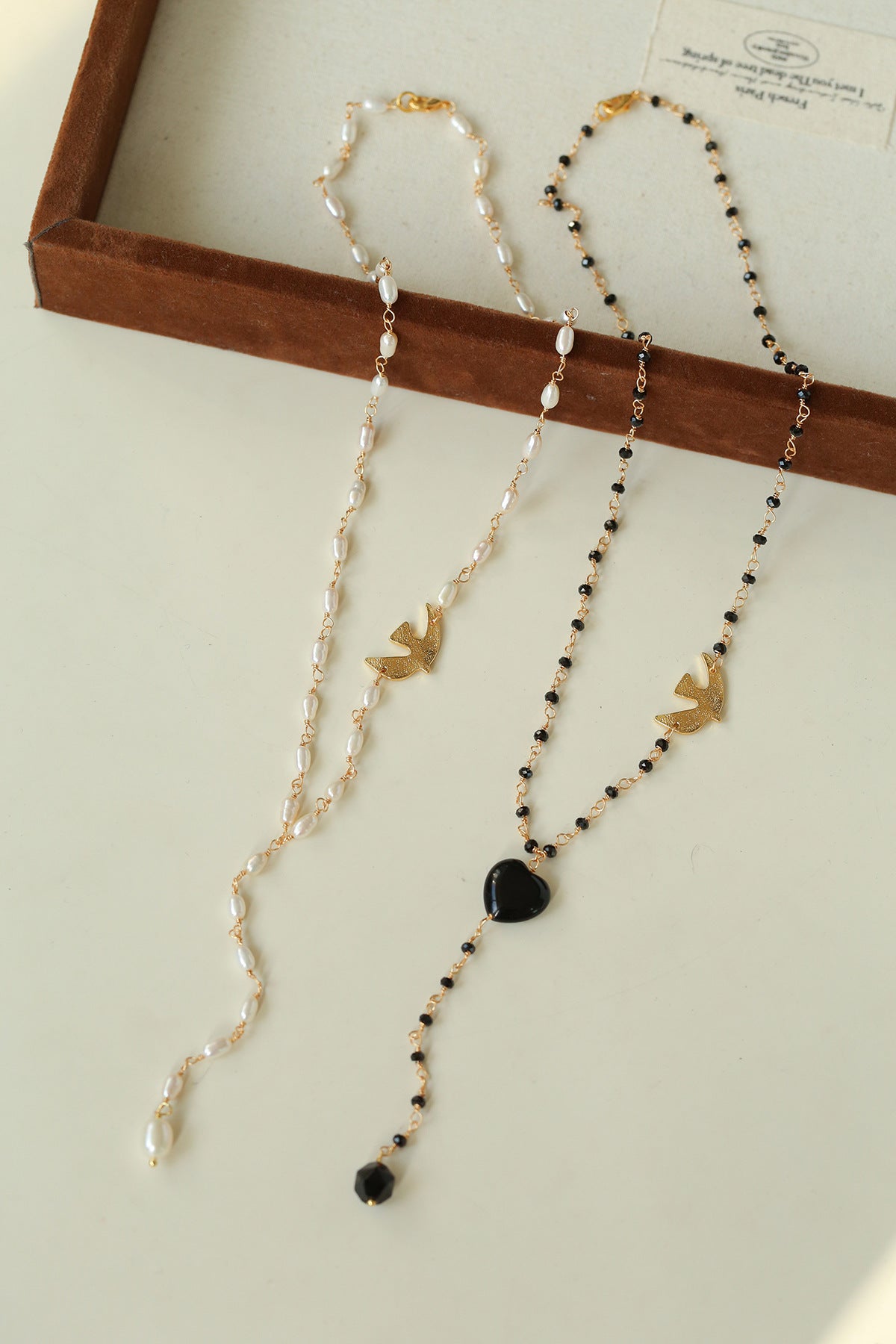 Baroque Pearl Lariat Necklace with Bird Charm